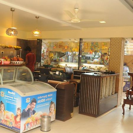 Suvarna Regency Hassan Esterno foto