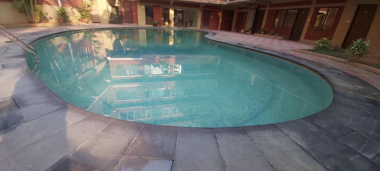 Suvarna Regency Hassan Esterno foto