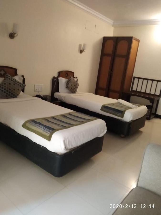 Suvarna Regency Hassan Esterno foto